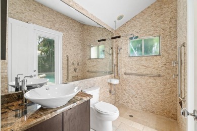 Experience luxury and comfort in this beautifully updated on Boca Delray Golf and Country Club in Florida - for sale on GolfHomes.com, golf home, golf lot