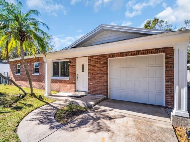 Exquisite Light-Filled Remodeled Home in Clearwater Country Club on Clearwater Country Club in Florida - for sale on GolfHomes.com, golf home, golf lot