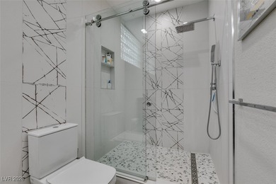 STUNNING RECENTLY RENOVATED CONTEMPORARY HOME ON AN OVERSIZED on Spanish Trail Golf and Country Club in Nevada - for sale on GolfHomes.com, golf home, golf lot