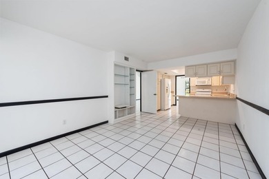 Enjoy breathtaking views of the lake and golf course from this on  in Florida - for sale on GolfHomes.com, golf home, golf lot