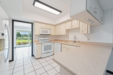 Enjoy breathtaking views of the lake and golf course from this on  in Florida - for sale on GolfHomes.com, golf home, golf lot