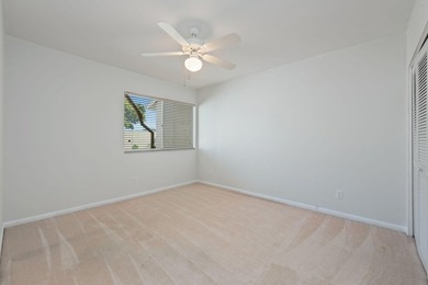 Enjoy breathtaking views of the lake and golf course from this on  in Florida - for sale on GolfHomes.com, golf home, golf lot