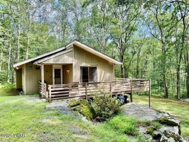Hemlock Farm's gated community you will find this sweet woodland on Lords Valley Country Club, Inc in Pennsylvania - for sale on GolfHomes.com, golf home, golf lot
