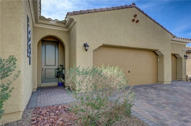 This immaculate and inviting single story home overlooks the 7th on Tuscany Golf Club in Nevada - for sale on GolfHomes.com, golf home, golf lot