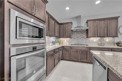 This immaculate and inviting single story home overlooks the 7th on Tuscany Golf Club in Nevada - for sale on GolfHomes.com, golf home, golf lot