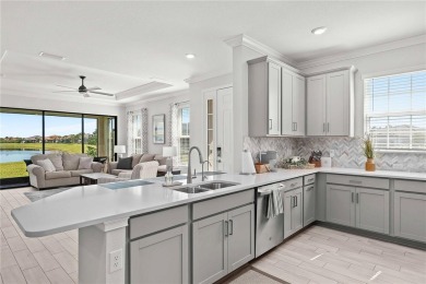 This exquisite Ibis villa is your opportunity to own a slice of on Esplanade Golf and Country at Lakewood Ranch in Florida - for sale on GolfHomes.com, golf home, golf lot