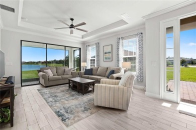 This exquisite Ibis villa is your opportunity to own a slice of on Esplanade Golf and Country at Lakewood Ranch in Florida - for sale on GolfHomes.com, golf home, golf lot