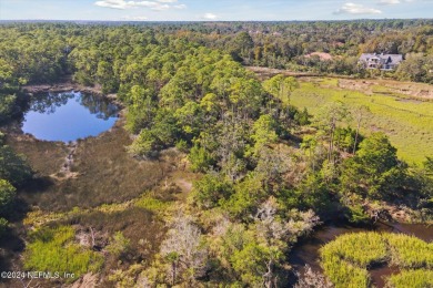 This stunning 2.2-acre waterfront/marsh-front estate lot is the on The Palencia Club in Florida - for sale on GolfHomes.com, golf home, golf lot