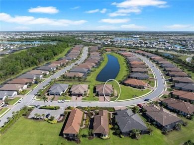 This exquisite Ibis villa is your opportunity to own a slice of on Esplanade Golf and Country at Lakewood Ranch in Florida - for sale on GolfHomes.com, golf home, golf lot