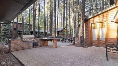 Imagine a home where every detail reflects a commitment to on Pinetop Lakes Country Club in Arizona - for sale on GolfHomes.com, golf home, golf lot