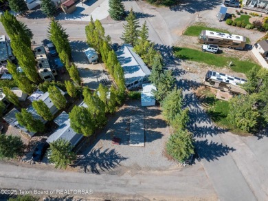 Enjoy the perfect blend of relaxation and recreation on this on Star Valley RV Golf Course in Wyoming - for sale on GolfHomes.com, golf home, golf lot