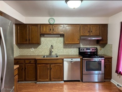 Welcome home to this spacious 3-bedroom, 1.5-bath townhome on Ridgewood Golf Course in Ohio - for sale on GolfHomes.com, golf home, golf lot