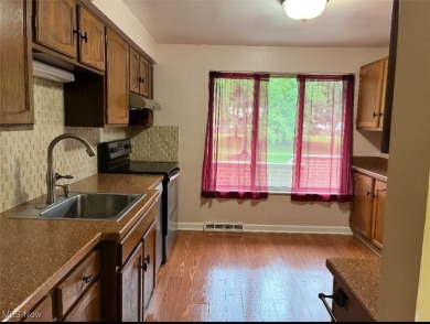 Welcome home to this spacious 3-bedroom, 1.5-bath townhome on Ridgewood Golf Course in Ohio - for sale on GolfHomes.com, golf home, golf lot