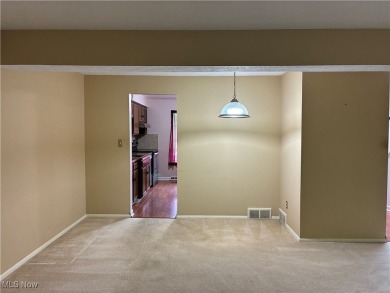Welcome home to this spacious 3-bedroom, 1.5-bath townhome on Ridgewood Golf Course in Ohio - for sale on GolfHomes.com, golf home, golf lot