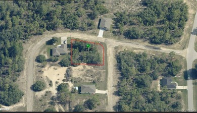 Here's your chance to grab a spacious 0.34-acre corner lot in on Pine Ridge Community Golf and Country Club in Florida - for sale on GolfHomes.com, golf home, golf lot