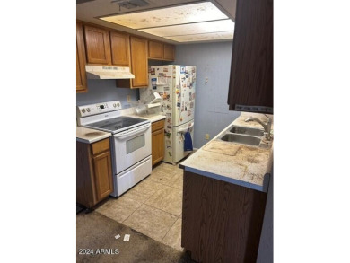 RENOVATION & REPAIRS NEEDED.
One-story townhouse located in a on Alta Mesa Golf Club in Arizona - for sale on GolfHomes.com, golf home, golf lot