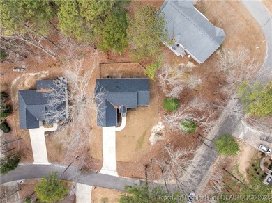 Built in 2024 and thoughtfully enhanced beyond the builder's on Carolina Trace Country Club in North Carolina - for sale on GolfHomes.com, golf home, golf lot