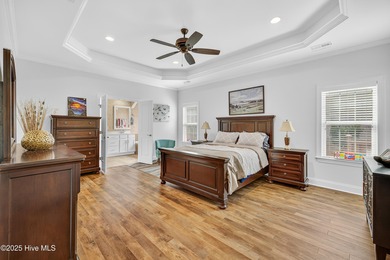 Experience elegant, low-maintenance living in this stunning on Cape Fear National At Brunswick Forest in North Carolina - for sale on GolfHomes.com, golf home, golf lot