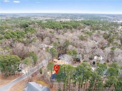 Built in 2024 and thoughtfully enhanced beyond the builder's on Carolina Trace Country Club in North Carolina - for sale on GolfHomes.com, golf home, golf lot