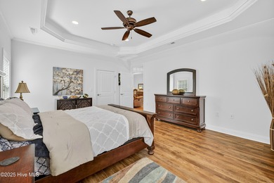 Experience elegant, low-maintenance living in this stunning on Cape Fear National At Brunswick Forest in North Carolina - for sale on GolfHomes.com, golf home, golf lot