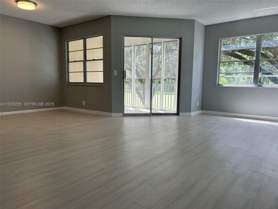 Beautiful 1/1.5 condo whit 1045 sf Living area in a gated on Flamingo Lakes Country Club in Florida - for sale on GolfHomes.com, golf home, golf lot