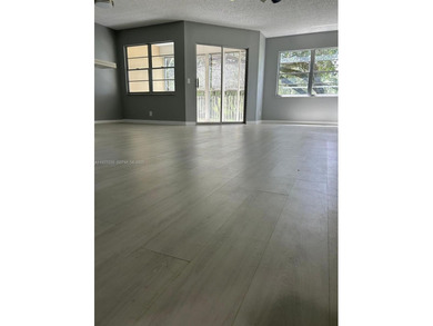 Beautiful 1/1.5 condo whit 1045 sf Living area in a gated on Flamingo Lakes Country Club in Florida - for sale on GolfHomes.com, golf home, golf lot