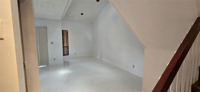 Lovely townhome. It features fresh paint, new porcelain tile on on Woodmont Country Club in Florida - for sale on GolfHomes.com, golf home, golf lot