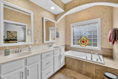 Experience elegant, low-maintenance living in this stunning on Cape Fear National At Brunswick Forest in North Carolina - for sale on GolfHomes.com, golf home, golf lot