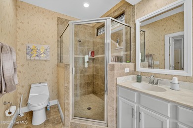 Experience elegant, low-maintenance living in this stunning on Cape Fear National At Brunswick Forest in North Carolina - for sale on GolfHomes.com, golf home, golf lot