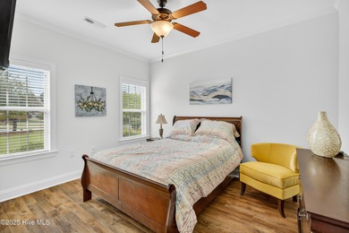 Experience elegant, low-maintenance living in this stunning on Cape Fear National At Brunswick Forest in North Carolina - for sale on GolfHomes.com, golf home, golf lot