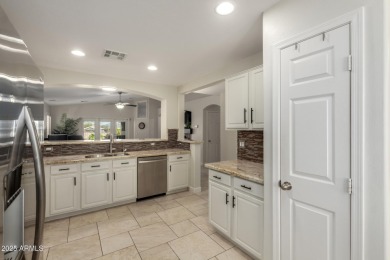 Beautiful home that backs to the San Tan Highlands Golf Course on The Golf Club At Johnson Ranch in Arizona - for sale on GolfHomes.com, golf home, golf lot