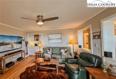 Beautifully updated turnkey unit with luxury vinal plank floors on Beech Mountain Club in North Carolina - for sale on GolfHomes.com, golf home, golf lot