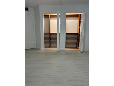 Beautiful 1/1.5 condo whit 1045 sf Living area in a gated on Flamingo Lakes Country Club in Florida - for sale on GolfHomes.com, golf home, golf lot