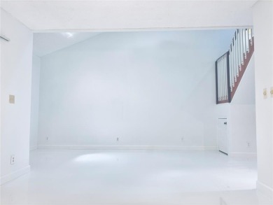 Lovely townhome. It features fresh paint, new porcelain tile on on Woodmont Country Club in Florida - for sale on GolfHomes.com, golf home, golf lot