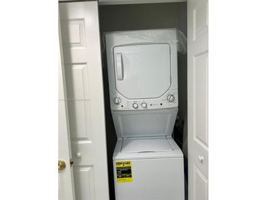 Beautiful 1/1.5 condo whit 1045 sf Living area in a gated on Flamingo Lakes Country Club in Florida - for sale on GolfHomes.com, golf home, golf lot