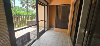 Lovely townhome. It features fresh paint, new porcelain tile on on Woodmont Country Club in Florida - for sale on GolfHomes.com, golf home, golf lot