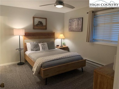 Beautifully updated turnkey unit with luxury vinal plank floors on Beech Mountain Club in North Carolina - for sale on GolfHomes.com, golf home, golf lot