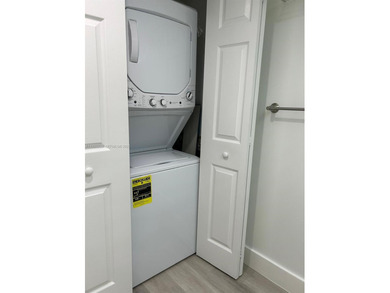 Beautiful 1/1.5 condo whit 1045 sf Living area in a gated on Flamingo Lakes Country Club in Florida - for sale on GolfHomes.com, golf home, golf lot