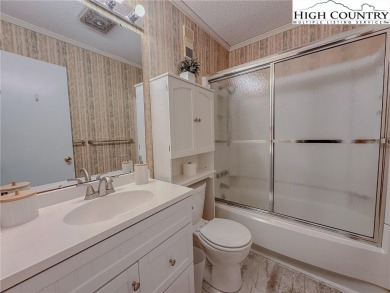 Beautifully updated turnkey unit with luxury vinal plank floors on Beech Mountain Club in North Carolina - for sale on GolfHomes.com, golf home, golf lot