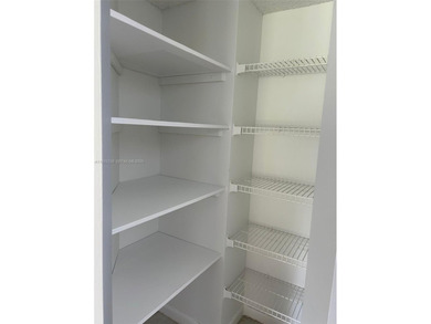 Beautiful 1/1.5 condo whit 1045 sf Living area in a gated on Flamingo Lakes Country Club in Florida - for sale on GolfHomes.com, golf home, golf lot