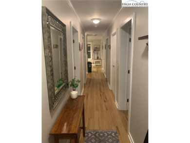Beautifully updated turnkey unit with luxury vinal plank floors on Beech Mountain Club in North Carolina - for sale on GolfHomes.com, golf home, golf lot