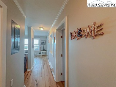 Beautifully updated turnkey unit with luxury vinal plank floors on Beech Mountain Club in North Carolina - for sale on GolfHomes.com, golf home, golf lot