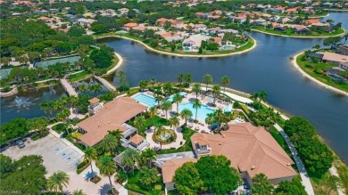 Discover the splendor of this exquisite lakeside residence on Arrowhead Golf Club At Heritage Greens in Florida - for sale on GolfHomes.com, golf home, golf lot