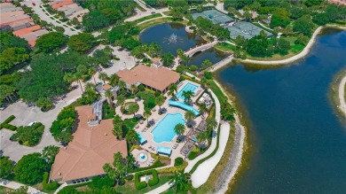 Discover the splendor of this exquisite lakeside residence on Arrowhead Golf Club At Heritage Greens in Florida - for sale on GolfHomes.com, golf home, golf lot