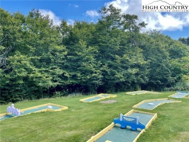 Beautifully updated turnkey unit with luxury vinal plank floors on Beech Mountain Club in North Carolina - for sale on GolfHomes.com, golf home, golf lot