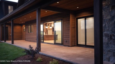 This brand-new custom home in Teton Reserve sits on one of the on Teton Reserve in Idaho - for sale on GolfHomes.com, golf home, golf lot