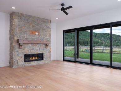 This brand-new custom home in Teton Reserve sits on one of the on Teton Reserve in Idaho - for sale on GolfHomes.com, golf home, golf lot