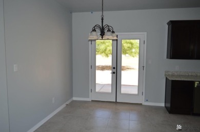 MOVE IN READY. NEW SPEC HOME IN COYOTE WASH GOLF COURSE on The Links At Coyote Wash in Arizona - for sale on GolfHomes.com, golf home, golf lot
