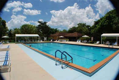 Oaks Clubhouse Building 79 offer the most spectaular golf, lake on Palm-Aire Country Club and Resort - The Oaks in Florida - for sale on GolfHomes.com, golf home, golf lot