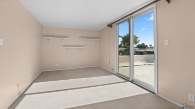 Ease of living in this condo with views of the beautiful Yuma on Yuma Golf and Country Club in Arizona - for sale on GolfHomes.com, golf home, golf lot